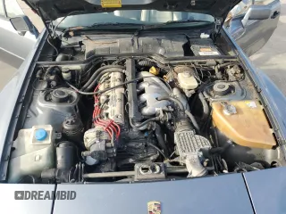 1991 Porsche 944 z VIN WP0ZZZ94ZLN431804, wystawiony jako Copart lot #73870554 z przebiegiem 131 475 mil mil oraz Szkoda całkowita • Salvage title. Historia ofert i sprzedaży dostępna na DreamBid. Obrazek 11.