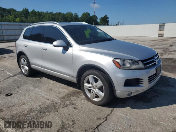 2014 Volkswagen Touareg Lux with VIN WVGEF9BP1ED012267, listed as a Copart auction lot 58924055 with 81,009 mi miles and Salvage title. Bid and sale history available at DreamBid. Image 4.
