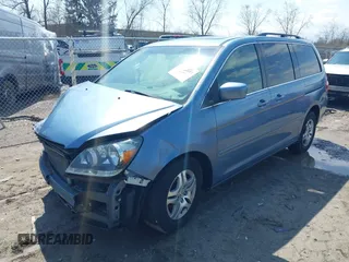 2007 Honda Odyssey EX-L with VIN 5FNRL38727B092077, listed as a IAAI auction lot 41972810 with 211,770 mi miles and . Bid and sale history available at DreamBid. Image 18.