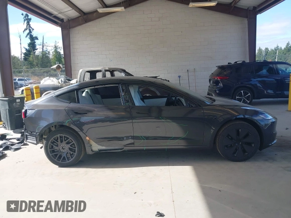 2025 Tesla Model 3 Long Range z VIN 5YJ3E1EA6SF990792, wystawiony jako IAAI lot #42713456 z przebiegiem 1 038 mil mil oraz . Historia ofert i sprzedaży dostępna na DreamBid. Obrazek 14.