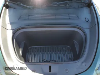 2022 Tesla Model Y Performance z VIN 7SAYGDEF2NF573979, wystawiony jako Copart lot #57778265 z przebiegiem 49 232 mil mil oraz Szkoda całkowita • Salvage title. Historia ofert i sprzedaży dostępna na DreamBid. Obrazek 12.