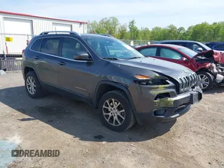 2016 Jeep Cherokee Latitude with VIN 1C4PJMCS2GW360748, listed as a IAAI auction lot 42243060 with 118,856 mi miles and . Bid and sale history available at DreamBid. Image 1.