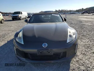2014 Nissan 370Z Touring with VIN JN1AZ4FH3EM620195, listed as a Copart auction lot 83207104 with 66,974 mi miles and Salvage Title. Bid and sale history available at DreamBid. Image 5.