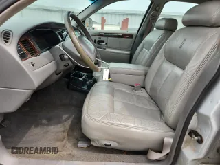 1998 Lincoln Town Car Cartier z VIN 1LNFM83W6WY649580, wystawiony jako Copart lot #59198865 z przebiegiem 253 735 mil mil oraz Czysty tytuł • Clean title. Historia ofert i sprzedaży dostępna na DreamBid. Obrazek 7.