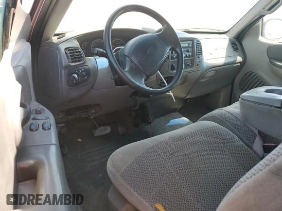 1999 Ford F-150 XL with VIN 1FTRX17L2XKB78998, listed as a Copart auction lot 65004535 with 155,271 mi miles and Salvage title. Bid and sale history available at DreamBid. Image 8.