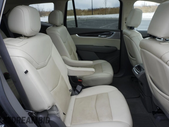 2021 Cadillac XT6 Premium Luxury z VIN 1GYKPDRS3MZ113033, wystawiony jako Copart lot #50076845 z przebiegiem 104 248 mil mil oraz Szkody całkowita. Historia ofert i sprzedaży dostępna na DreamBid. Obrazek 6.
