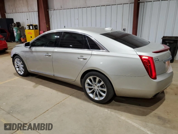 2016 Cadillac XTS Luxury Collection with VIN 2G61M5S33G9102053, listed as a Copart auction lot 46541965 with 69,285 mi miles and Salvage title. Bid and sale history available at DreamBid. Image 2.