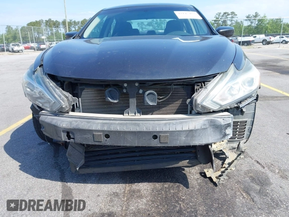 2018 Nissan Altima SR with VIN 1N4AL3AP8JC224924, listed as a IAAI auction lot 42145463 with 124,748 mi miles and . Bid and sale history available at carsss.com. Image 6.