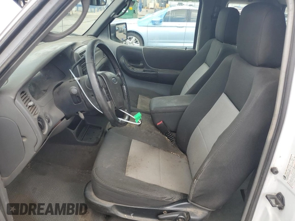 2011 Ford Ranger XL with VIN 1FTKR1ED6BPA27455, listed as a Copart auction lot 58354945 with 263,663 mi miles and Salvage title. Bid and sale history available at DreamBid. Image 7.