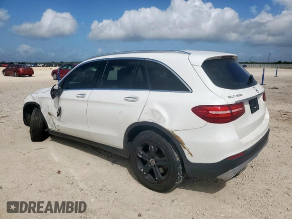 2018 Mercedes-Benz GLC 300 with VIN WDC0G4JB3JV025492, listed as a Copart auction lot 61674235 with 99,671 mi miles and Salvage title. Bid and sale history available at DreamBid. Image 2.