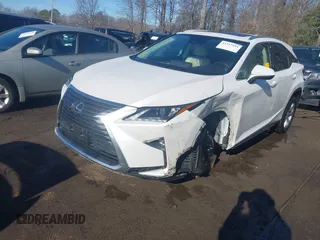 2018 Lexus RX 350 z VIN 2T2BZMCAXJC161520, wystawiony jako IAAI lot #41357954 z przebiegiem 105 427 mil mil oraz . Historia ofert i sprzedaży dostępna na DreamBid. Obrazek 2.
