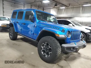 2022 Jeep Wrangler Unlimited Rubicon with VIN 1C4JJXR69NW190564, listed as a Copart auction lot 83703504 with 16,803 mi miles and Salvage title. Bid and sale history available at DreamBid. Image 4.