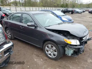 2010 Kia Optima LX with VIN KNAGG4A82A5394267, listed as a IAAI auction lot 41955386 with 134,912 mi miles. Bid and sale history available at carsss.com. Image 1.