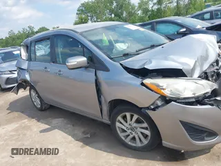 2014 Mazda 5 Sport with VIN JM1CW2BL6E0164195, listed as a IAAI auction lot 42455158 with 155,007 mi miles and . Bid and sale history available at DreamBid. Image 14.
