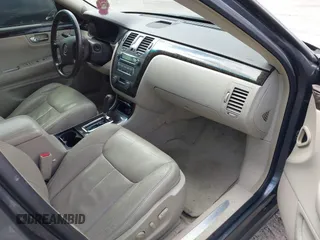 2010 Cadillac DTS w/1SC with VIN 1G6KD5EY3AU137889, listed as a IAAI auction lot 41799888 with 171,546 mi miles. Bid and sale history available at carsss.com. Image 5.