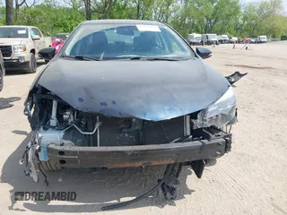2018 Toyota Corolla L with VIN 2T1BURHE1JC111066, listed as a IAAI auction lot 42215074 with 106,677 mi miles and . Bid and sale history available at DreamBid. Image 13.