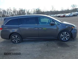 2016 Honda Odyssey Touring Elite with VIN 5FNRL5H90GB128006, listed as a IAAI auction lot 41695438 with 133,337 mi miles. Bid and sale history available at carsss.com. Image 13.