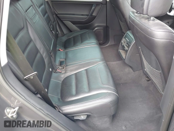 2012 Volkswagen Touareg Sport with VIN WVGFK9BP0CD002939, listed as a IAAI auction lot 42531654 with 222,435 mi miles and . Bid and sale history available at DreamBid. Image 8.