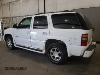 2003 GMC Yukon Denali z VIN 1GKEK63U23J136487, wystawiony jako Copart lot #57974035 z przebiegiem 280 637 mil mil oraz Tytuł czysty. Historia ofert i sprzedaży dostępna na DreamBid. Obrazek 2.
