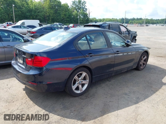 2014 BMW 3 Series 328i with VIN WBA3A5C53EJ463411, listed as a IAAI auction lot 42732421 with 41,408 mi miles and . Bid and sale history available at DreamBid. Image 4.