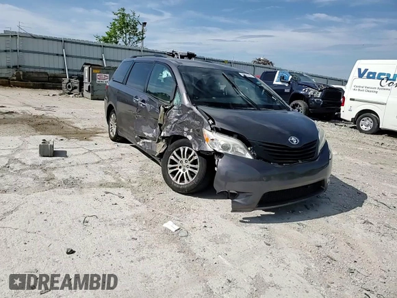2015 Toyota Sienna XLE with VIN 5TDYK3DC5FS643985, listed as a Copart auction lot 56956505 with 179,131 mi miles and Salvage title. Bid and sale history available at DreamBid. Image 14.
