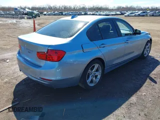 2014 BMW 3 Series 328i with VIN WBA3C1C56EAV79706, listed as a IAAI auction lot 41807033 with 104,478 mi miles. Bid and sale history available at carsss.com. Image 4.