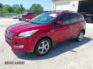 2013 Ford Escape SE with VIN 1FMCU0GX6DUB30766, listed as a IAAI auction lot 42140087 with 200,188 mi miles and . Bid and sale history available at carsss.com. Image 2.