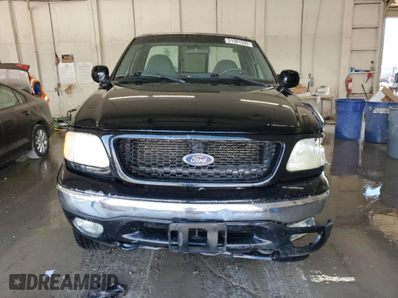 2003 Ford F-150 with VIN 2FTRF08L03CA03160, listed as a Copart auction lot 51591535 with 220,630 mi miles and Salvage title. Bid and sale history available at DreamBid. Image 5.
