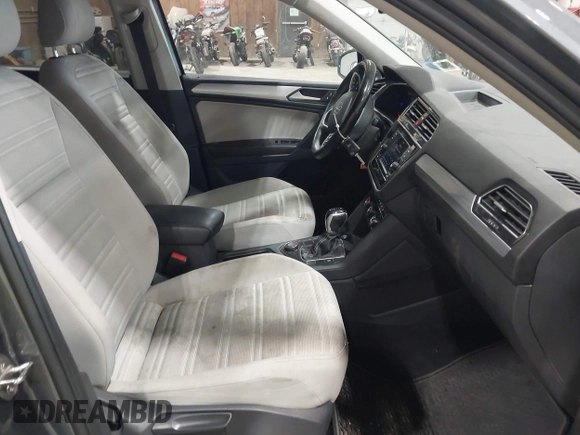 2022 Volkswagen Tiguan S z VIN 3VV0B7AX2NM042934, wystawiony jako IAAI lot #42172199 z przebiegiem 71 367 mil mil oraz . Historia ofert i sprzedaży dostępna na DreamBid. Obrazek 5.