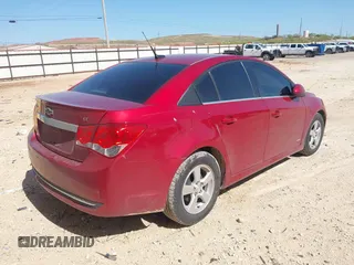 2014 Chevrolet Cruze 1LT z VIN 1G1PC5SB3E7237641, wystawiony jako IAAI lot #41991370 z przebiegiem 106 674 mil mil oraz . Historia ofert i sprzedaży dostępna na DreamBid. Obrazek 4.