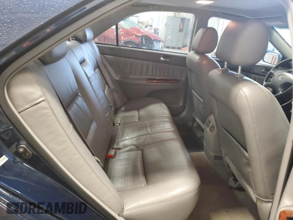 2003 Toyota Camry LE z VIN 4T1BF30K23U058761, wystawiony jako Copart lot #51286985 z przebiegiem 90 143 mil mil oraz Nie do naprawy • Non repairable. Historia ofert i sprzedaży dostępna na DreamBid. Obrazek 11.