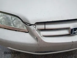 2002 Honda Accord LX z VIN JHMCG56402C025464, wystawiony jako IAAI lot #42458693 z przebiegiem 257 711 mil mil oraz . Historia ofert i sprzedaży dostępna na DreamBid. Obrazek 6.