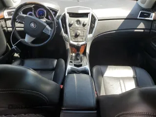 2012 Cadillac SRX Performance Collection z VIN 3GYFNEE31CS602568, wystawiony jako Copart lot #54751375 z przebiegiem 144 228 mil mil oraz Szkody całkowita. Historia ofert i sprzedaży dostępna na DreamBid. Obrazek 8.