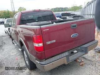 2004 Ford F-150 XLT with VIN 1FTPW12564KD77115, listed as a IAAI auction lot 41929386 with 213,172 mi miles. Bid and sale history available at carsss.com. Image 3.