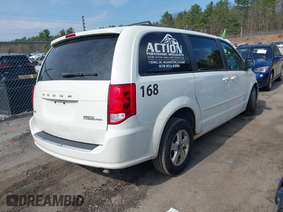2012 Dodge Grand Caravan SXT with VIN 2C4RDGCGXCR358794, listed as a IAAI auction lot 42007316 with 212,518 mi miles and . Bid and sale history available at DreamBid. Image 4.