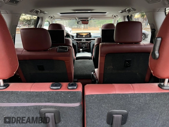 2016 Lexus LX 570 with VIN JTJHY7AX7G4203810, listed as a Copart auction lot 86017494 with 296,703 mi miles and Clean Title. Bid and sale history available at DreamBid. Image 9.