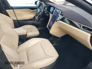 2016 Tesla Model S 70 with VIN 5YJSA1E11GF132015, listed as a IAAI auction lot 41408676 with 137,271 mi miles and . Bid and sale history available at DreamBid. Image 5.