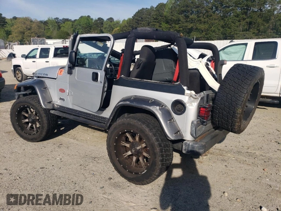 2003 Jeep Wrangler Rubicon z VIN 1J4FA69S53P375189, wystawiony jako Copart lot #54292035 z przebiegiem 55 863 mil mil oraz Szkoda całkowita • Salvage title. Historia ofert i sprzedaży dostępna na DreamBid. Obrazek 2.