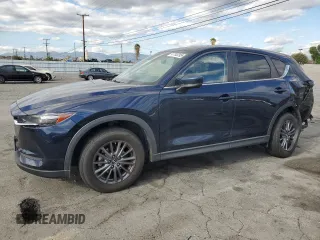 2021 Mazda CX-5 Touring with VIN JM3KFACM7M0410366, listed as a Copart auction lot 47793295 with 88,929 mi miles and Salvage Title. Bid and sale history available at carsss.com. Image 1.