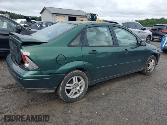 2000 Ford Focus SE with VIN 1FAFP3433YW354797, listed as a Copart auction lot 61430265 with 165,202 mi miles and Salvage title. Bid and sale history available at DreamBid. Image 3.