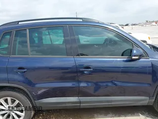 2015 Volkswagen Tiguan SE with VIN WVGAV7AX1FW508313, listed as a IAAI auction lot 42120704 with 136,405 mi miles and . Bid and sale history available at DreamBid. Image 13.