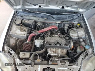 1999 Honda Civic DX with VIN 1HGEJ6125XL086017, listed as a Copart auction lot 58728564 with 262,100 mi miles and Salvage Title. Bid and sale history available at carsss.com. Image 12.