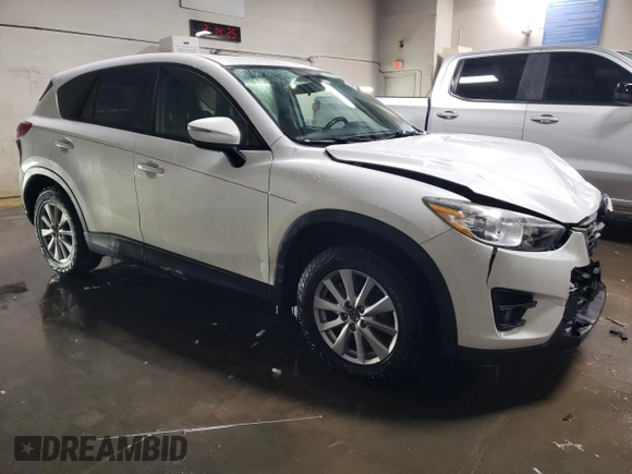 2016 Mazda CX-5 Touring with VIN JM3KE2CY7G0666474, listed as a Copart auction lot 45502575 with 162,881 mi miles and Salvage Title. Bid and sale history available at carsss.com. Image 4.