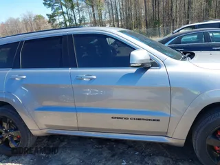 2016 Jeep Grand Cherokee High Altitude with VIN 1C4RJFCG9GC370842, listed as a IAAI auction lot 41815639 with 111,883 mi miles. Bid and sale history available at carsss.com. Image 14.