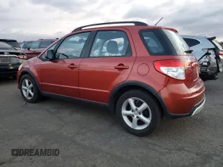 2009 Suzuki SX4 Man AWD with VIN JS2YB413696201043, listed as a Copart auction lot 86283064 with 153,286 mi miles and Salvage Title. Bid and sale history available at carsss.com. Image 2.