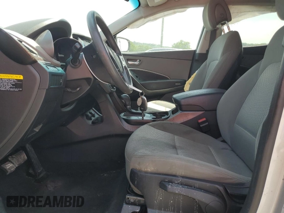 2018 Hyundai Santa Fe 2.4L z VIN 5XYZTDLB5JG551524, wystawiony jako Copart lot #57170985 z przebiegiem 139 248 mil mil oraz Szkoda całkowita • Salvage title. Historia ofert i sprzedaży dostępna na DreamBid. Obrazek 7.
