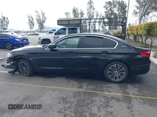2019 BMW 5 Series 530e with VIN WBAJA9C52KB399480, listed as a IAAI auction lot 41714228 with 90,435 mi miles and . Bid and sale history available at DreamBid. Image 14.