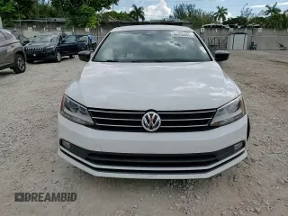 2016 Volkswagen Jetta Sport z VIN 3VWD17AJ1GM404816, wystawiony jako Copart lot #46916355 z przebiegiem 71 748 mil mil oraz Szkoda całkowita • Salvage title. Historia ofert i sprzedaży dostępna na DreamBid. Obrazek 13.