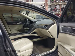 2013 Lincoln MKZ Hybrid с VIN 3LN6L2LU4DR807585, выставлен на аукционе IAAI как лот 41706584 с пробегом 233 445 миль миль и . История ставок и продаж доступна на DreamBid. Изображение 5.