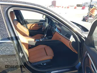 2017 BMW 3 Series 330e iPerformance with VIN WBA8E1C34HA156688, listed as a IAAI auction lot 41753490 with 74,130 mi miles. Bid and sale history available at carsss.com. Image 5.